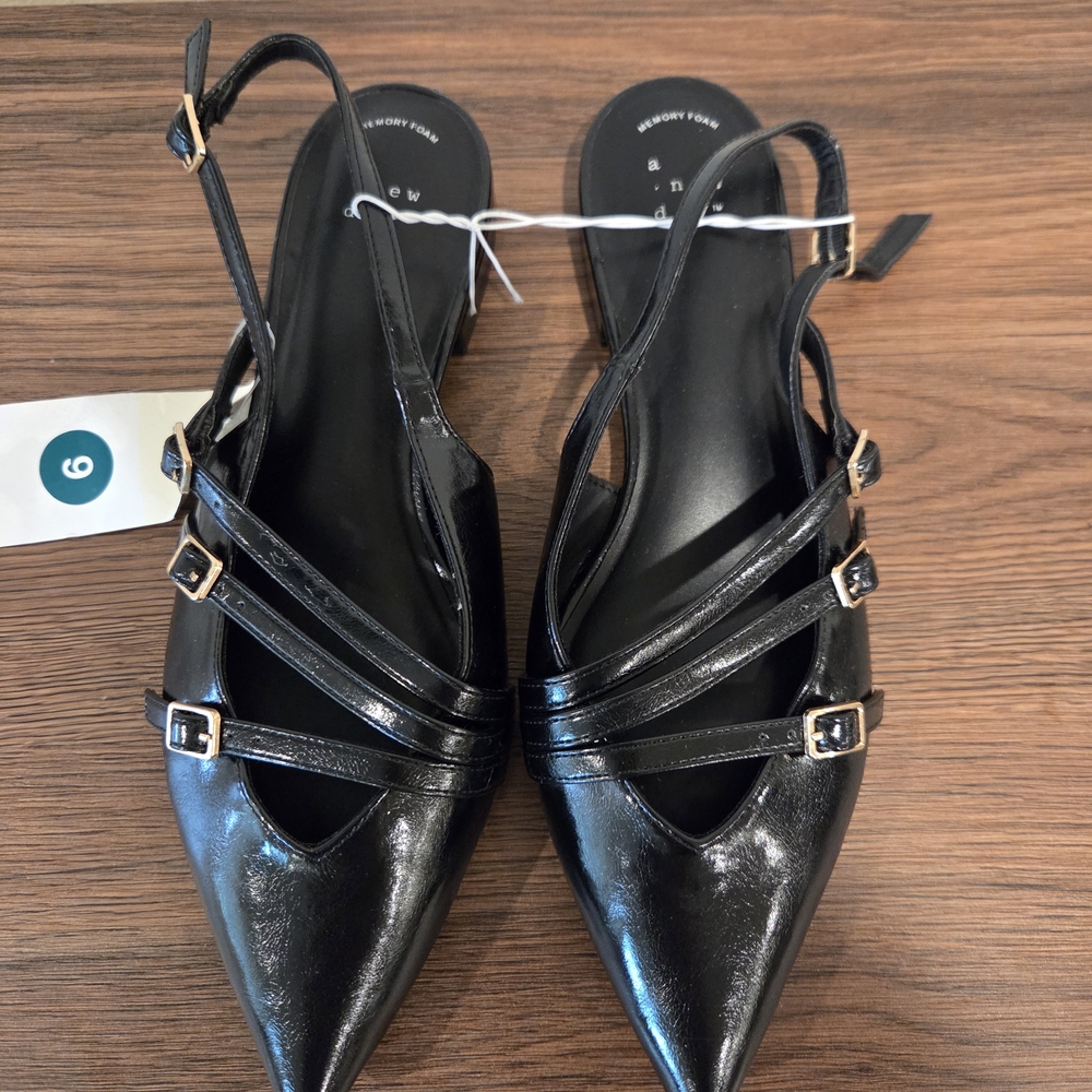 Slingback Pointed Toe Strappy Flats in Black With Gold Buckle.